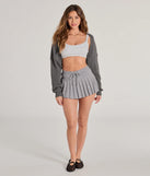 Get the look of a skirt and the comfort of shorts in the Pleated Charm High Waist Skort in charcoal, perfect for staying stylish while on the move this summer.