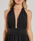 Perfect as a dress alternative for a date-night outfit, wedding guest attire, and cocktail party dress alike, the Sultry Sparkle Glitter Knit Plunging Halter Romper is a women's black romper that combines a stylish, unique design with festive colors and on-trend details for a standout look!