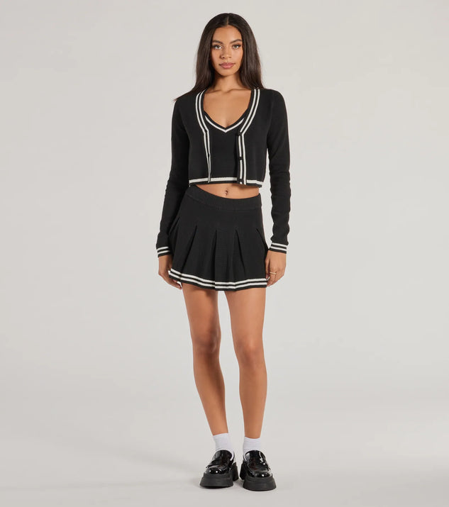 The Preppy Please Striped Pleated Knit Skort is a trendy women's bottom in black, designed with modern details and alluring textures to complete chic outfits for 2025.