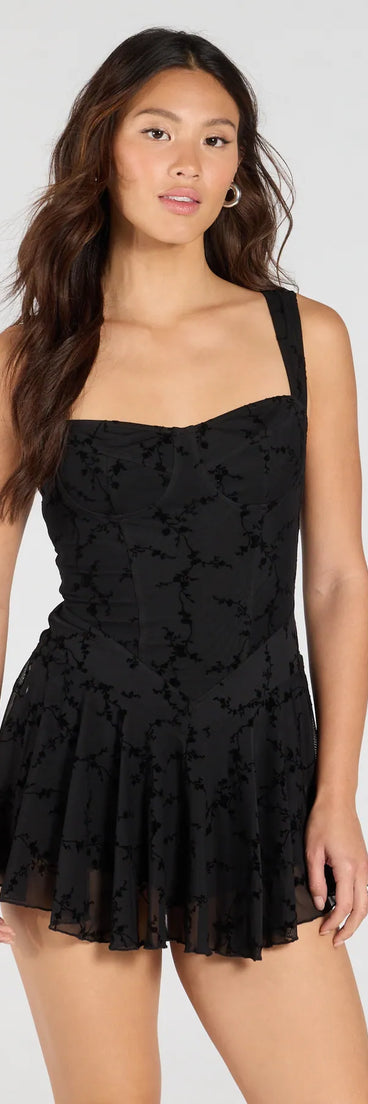 Designed for campus outfits, sleek workwear, and on-the-go moments, the Flirty Instinct Flocked Floral Velvet Ruffle Romper is a trendy black bottom for women bringing effortless fall versatility.
