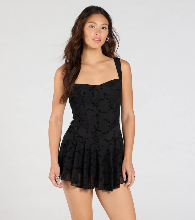 Create bold, fashion-forward looks for spring or summer with the Flirty Instinct Flocked Floral Velvet Ruffle Romper in black, a must-have piece from Windsor’s collection of stylish bottoms for women.
