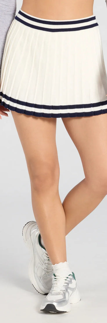 With a flirty cut and hidden shorts underneath, the Preppy Demure Pleated Striped Knit Skort in ivory serves skirt vibes with zero wardrobe worries.