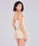Create bold, fashion-forward looks for spring or summer with the Simply Adorable Ruffled Drop Waist Lace Romper in ivory, a must-have piece from Windsor’s collection of stylish bottoms for women.