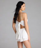 Choosing a ivory romper like the One Take V-Neck Ruffle Skater Romper means you’re ready for anything—no outfit planning needed, just style, go, and glow.