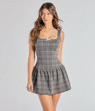 With its easy fit and flirty cut, the Perfect In Plaid Drop Waist A-Line Romper is a charcoal one-piece that brings fun, freedom, and movement to your weekend look.