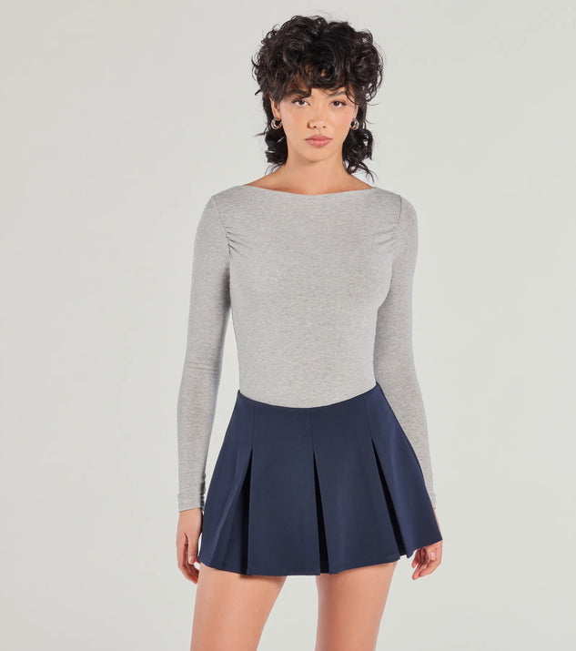 The Keeping It Cute Pleated Ponte Skort is a trendy women's bottom in navy blue, designed with modern details and alluring textures to complete chic outfits for 2025.