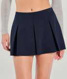 Create bold, fashion-forward looks for spring or summer with the Keeping It Cute Pleated Ponte Skort in navy blue, a must-have piece from Windsor’s collection of stylish bottoms for women.