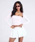 Create bold, fashion-forward looks for summer with the Keeping It Cute Pleated Ponte Skort in ivory, a must-have piece from Windsor’s collection of stylish bottoms for women.