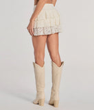 The Charming Allure Drop Waist Tiered Lace Skort is a trendy women's bottom in ivory, designed with modern details and alluring textures to complete chic outfits for 2025.