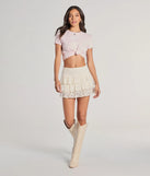 Create bold, fashion-forward looks for spring or summer with the Charming Allure Drop Waist Tiered Lace Skort in ivory, a must-have piece from Windsor’s collection of stylish bottoms for women.