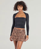 The In The Wild Leopard Ruffled Skort is a trendy women's bottom in leopard print, designed with modern details and alluring textures to complete chic outfits for 2025.