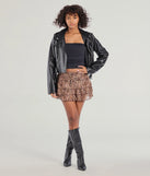 The In The Wild Leopard Ruffled Skort is a trendy women's bottom in leopard print, designed with modern details and alluring textures to complete chic outfits for 2025.