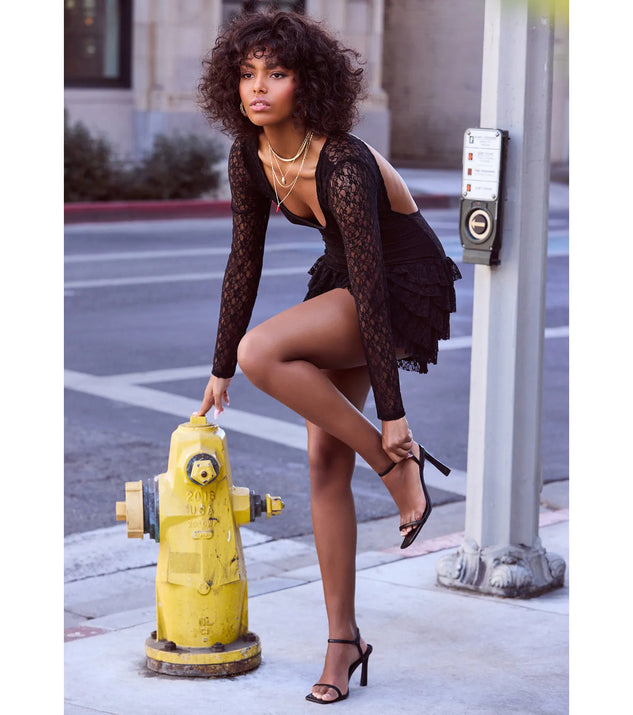 Make a bold statement in the Timeless Romance Open Back Lace Romper in black, the perfect spring dress for weddings, cocktail hours, nights out, and/or seasonal celebrations.