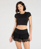 Create bold, fashion-forward looks for spring or summer with the Flirty Feels Ruffled Lace Mini Skort in black, a must-have piece from Windsor’s collection of stylish bottoms for women.