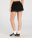 Create bold, fashion-forward looks for spring or summer with the Flirty Feels Ruffled Lace Mini Skort in black, a must-have piece from Windsor’s collection of stylish bottoms for women.