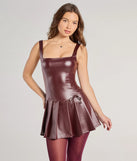 The Adorable And Sleek Faux Leather Skort Romper in wine is a modern red dress featuring trendy details and a stunning design ideal for wedding guest dresses, elegant cocktail looks, or an alluring Valentine’s Day dress.