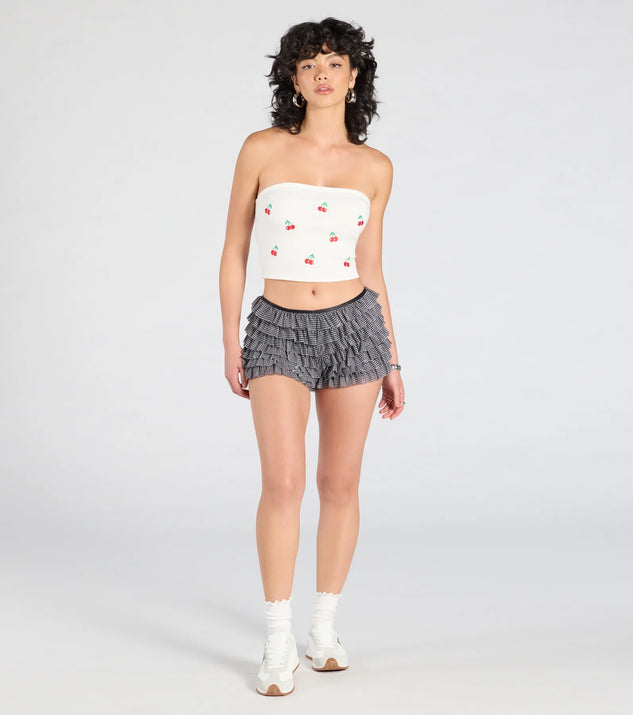 Create bold, fashion-forward looks for spring or summer with the Chic Statement Gingham Ruffle Hot Shorts in black, a must-have piece from Windsor’s collection of stylish bottoms for women.