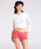 Create bold, fashion-forward looks for spring or summer with the Chic Statement Gingham Ruffle Hot Shorts in red, a must-have piece from Windsor’s collection of stylish bottoms for women.