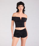 Create bold, fashion-forward looks for summer with the Center Stage Rhinestone Hot Shorts in black, a must-have piece from Windsor’s collection of stylish bottoms for women.