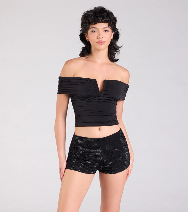 Create bold, fashion-forward looks for summer with the Center Stage Rhinestone Hot Shorts in black, a must-have piece from Windsor’s collection of stylish bottoms for women.