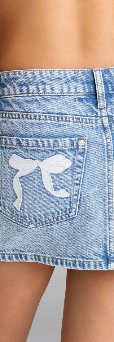 Style up your rotation with the Cutest View Bow Pocket Denim Mini Skirt , a trendy light blue skirt made to anchor every outfit with attitude and ease.