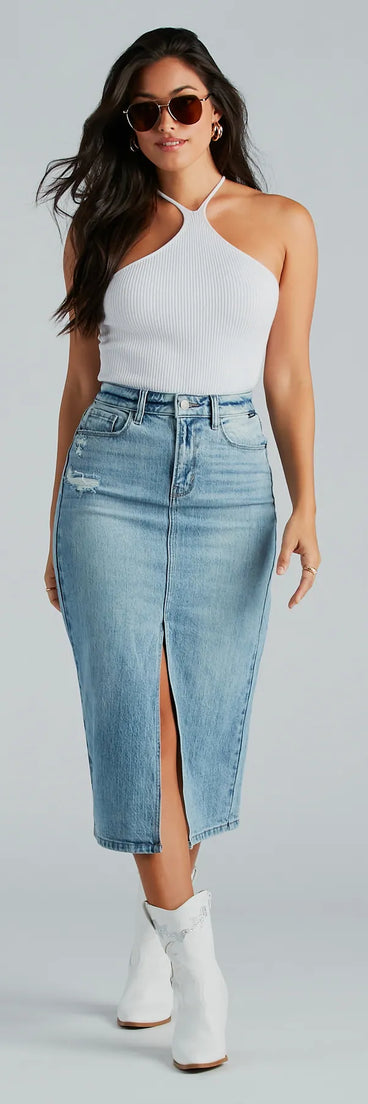 The denim wash and trendy design of the All That Denim Slit Midi Skirt is a chic fall piece for any wardrobe, versatile for everyday wear.