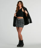 Create bold, fashion-forward looks for spring or summer with the Trendsetting Aesthetic Belted Denim Mini Skirt in black, a must-have piece from Windsor’s collection of stylish bottoms for women.
