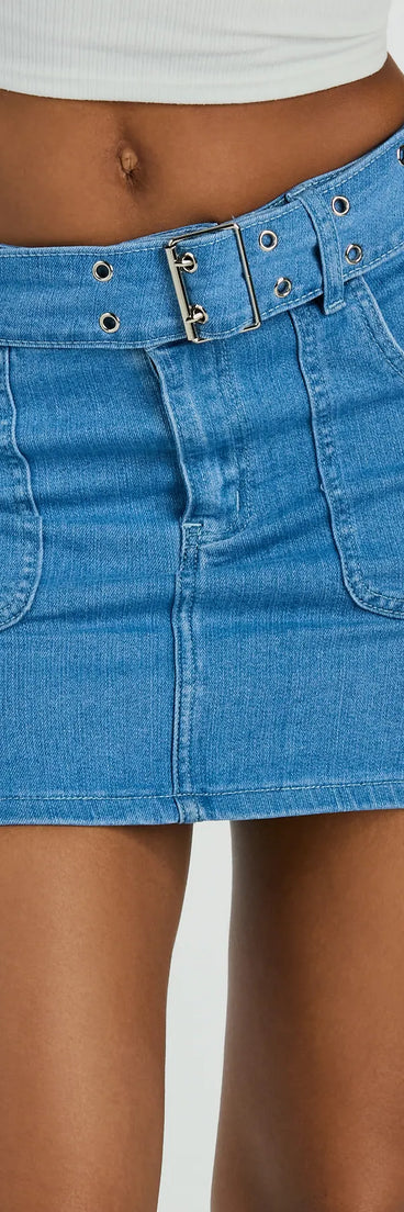 The Trendsetting Look Belted Denim Mini Skirt is a trendy women's bottom in medium denim wash, designed with modern details and alluring textures to complete chic outfits for 2025.