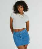 The Trendsetting Look Belted Denim Mini Skirt is a trendy women's bottom in medium denim wash, designed with modern details and alluring textures to complete chic outfits for 2025.