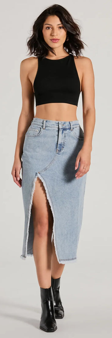 The denim wash and trendy design of the Cool Composure High-Rise Frayed Slit Denim Midi Skirt is a chic fall piece for any wardrobe, versatile for everyday wear.