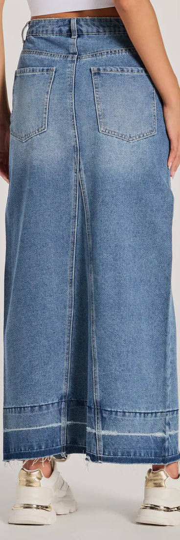 The denim wash and trendy design of the Coolest Vibe High Slit Denim Maxi Skirt is a chic fall piece for any wardrobe, versatile for everyday wear.
