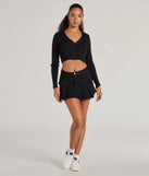 The Channel Cute Mid-Rise Pleated Denim Mini Skirt in black brings edge and energy to your vibe, ready to elevate any festival look or concert outfit.