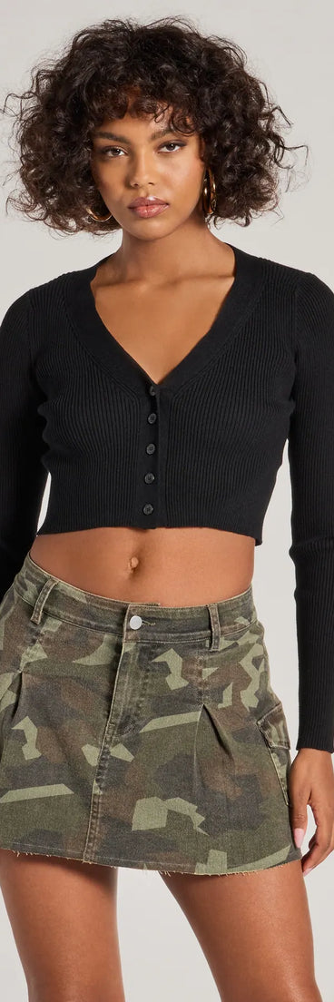 The Adventurous Babe Camo Pleated Cargo Mini Skirt is a olive cargo skirt, an effortlessly layer-friendly piece ideal for a celebration-ready look with a funtional-inspired flair.