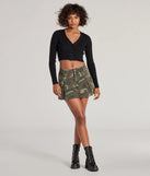 The Adventurous Babe Camo Pleated Cargo Mini Skirt is a olive cargo skirt, an effortlessly layer-friendly piece ideal for a celebration-ready look with a funtional-inspired flair.