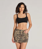 Create bold, fashion-forward looks for spring or summer with the Pretty Purrfect Leopard Print Denim Mini Skirt in leopard print, a must-have piece from Windsor’s collection of stylish bottoms for women.