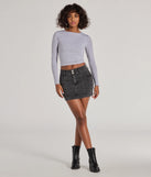Create bold, fashion-forward looks for spring or summer with the Casual Cool Girl Cargo Denim Mini Skirt in charcoal, a must-have piece from Windsor’s collection of stylish bottoms for women.