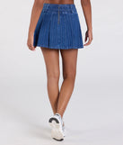 Create bold, fashion-forward looks for spring or summer with the Treat Yourself Mid-Rise Pleated Denim Mini Skirt in denim blue, a must-have piece from Windsor’s collection of stylish bottoms for women.