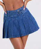 Create bold, fashion-forward looks for spring or summer with the Treat Yourself Mid-Rise Pleated Denim Mini Skirt in denim blue, a must-have piece from Windsor’s collection of stylish bottoms for women.