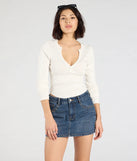 Create bold, fashion-forward looks for summer with the Tell Me About It Stud Mid Rise Denim Mini Skirt in dark denim wash, a must-have piece from Windsor’s collection of stylish bottoms for women.