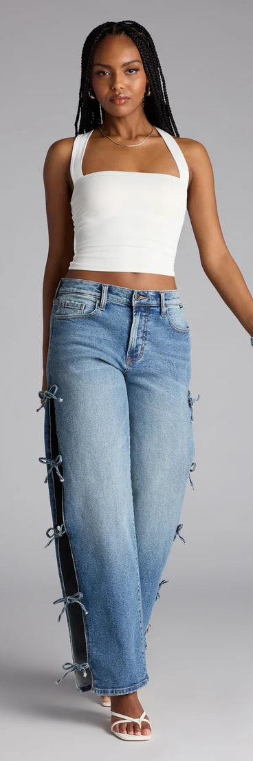 Style up your rotation with the Tied Up in Denim Bow Mid-Rise Denim Jeans, trendy medium denim wash jeans made to anchor every outfit with attitude and ease.