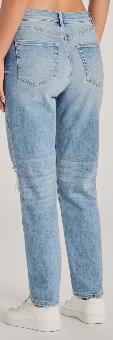 The Rocky High-Rise Destructed Boyfriend Jeans is a trendy women's bottom in medium denim wash, designed with modern details and alluring textures to complete chic outfits for 2025.