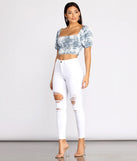 High Rise Destructed Denim Skinny Jeans