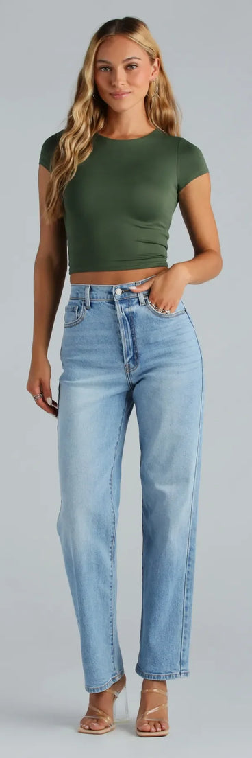 The Classic High-Rise Straight-Leg Boyfriend Jeans is a trendy women's bottom in medium denim wash, designed with modern details and alluring textures to complete chic outfits for 2025.