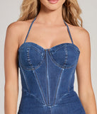 Create bold, fashion-forward looks for spring or summer with the Fresh Feels Halter Sweetheart Corset Denim Catsuit in dark denim wash, a must-have piece from Windsor’s collection of stylish bottoms for women.