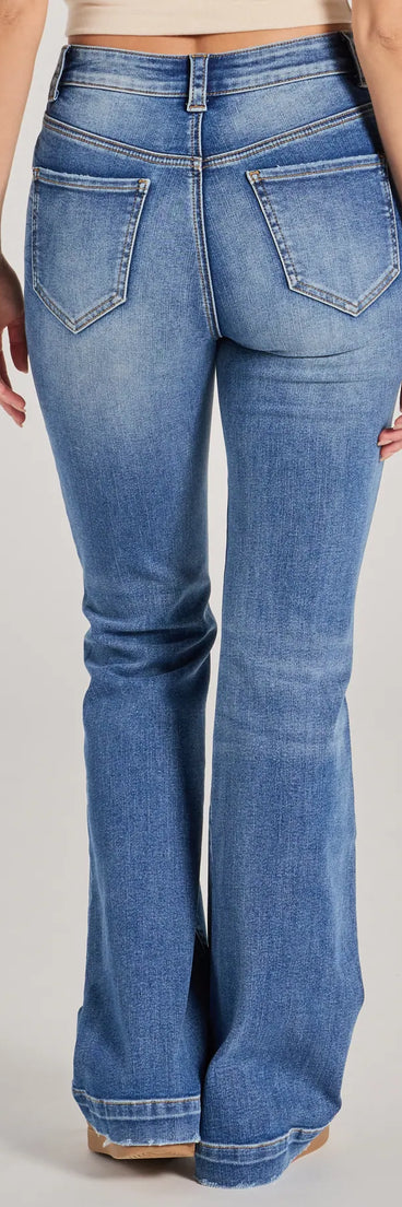 The Easy Favorite Mid-Rise Flare Denim Jeans is a trendy women's bottom in medium denim wash, designed with modern details and alluring textures to complete chic outfits for 2025.
