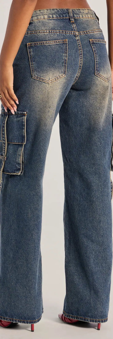 The Trendsetter High-Rise Wide-Leg Cargo Jeans is a trendy women's bottom in dark denim wash, designed with modern details and alluring textures to complete chic outfits for 2025.