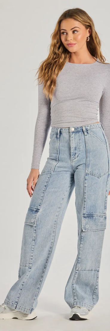 The Streetwear Vibe High-Rise Cargo Denim Jeans is a trendy women's bottom in medium denim wash, designed with modern details and alluring textures to complete chic outfits for 2025.