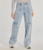 The Streetwear Vibe High-Rise Cargo Denim Jeans is a trendy women's bottom in medium denim wash, designed with modern details and alluring textures to complete chic outfits for 2025.