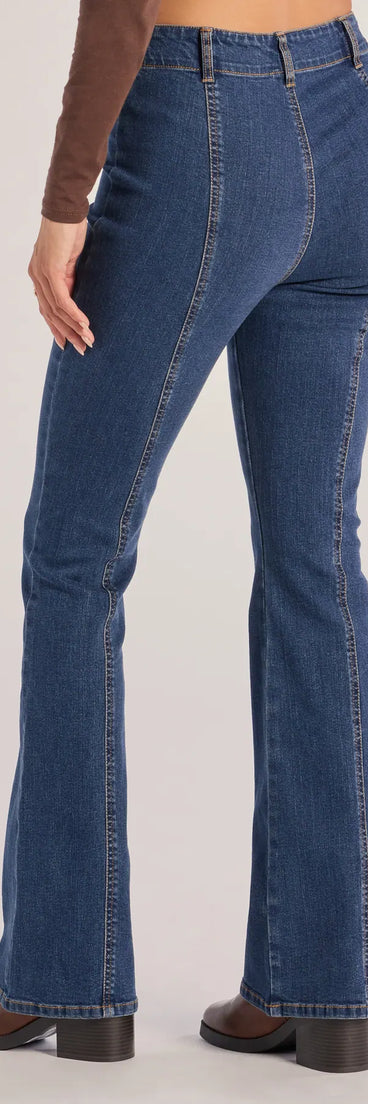 Elevate summer looks with the Seamlessly Chic High-Rise Bootcut Denim Jeans, a sleek pair of dark denim wash jeans designed for comfort, shape, and style.