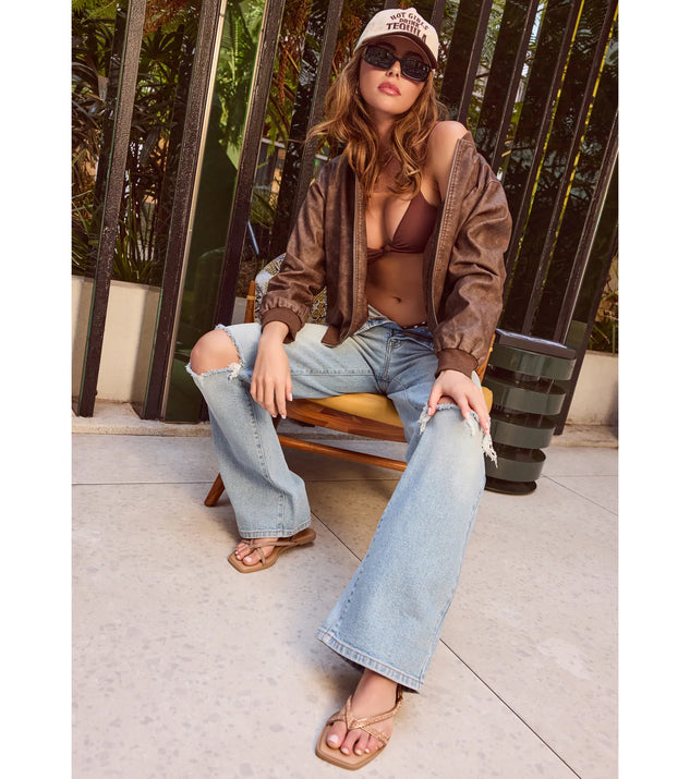 The Chill Vibes Only Baggy Destructed Denim Jeans is a trendy women's bottom in medium denim wash, designed with modern details and alluring textures to complete chic outfits for 2025.